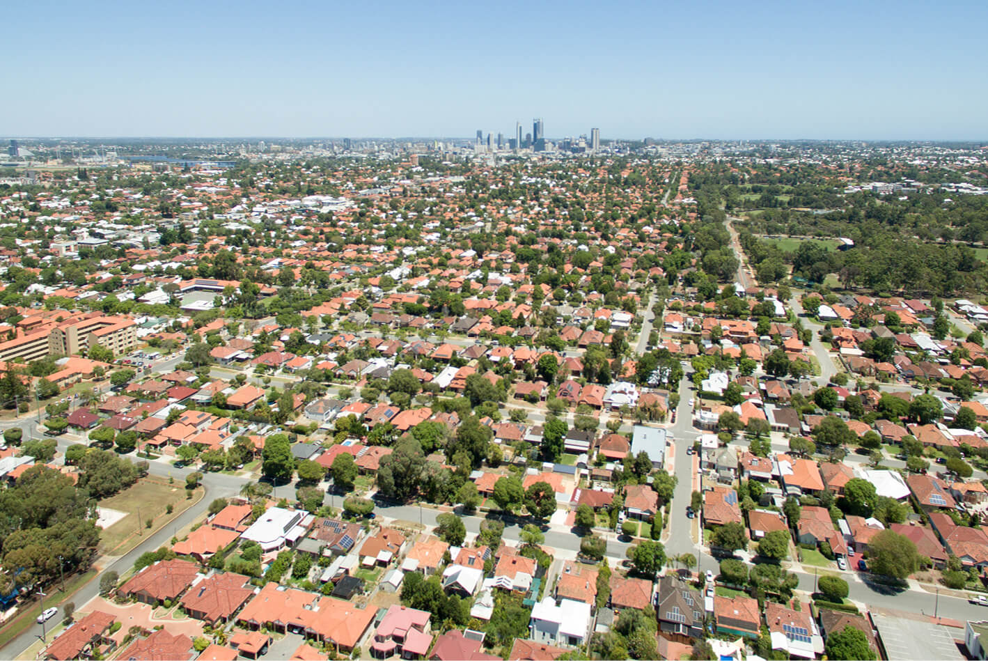 Birds eye view of a suburban area with lots of houses. 
