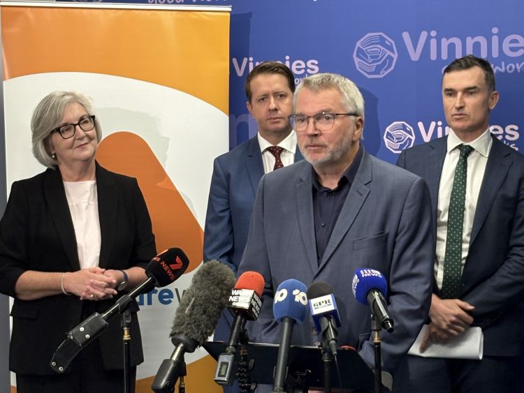 Mark Glasson speaking at a conference in partnership with Vinnies WA and the WA Government. 