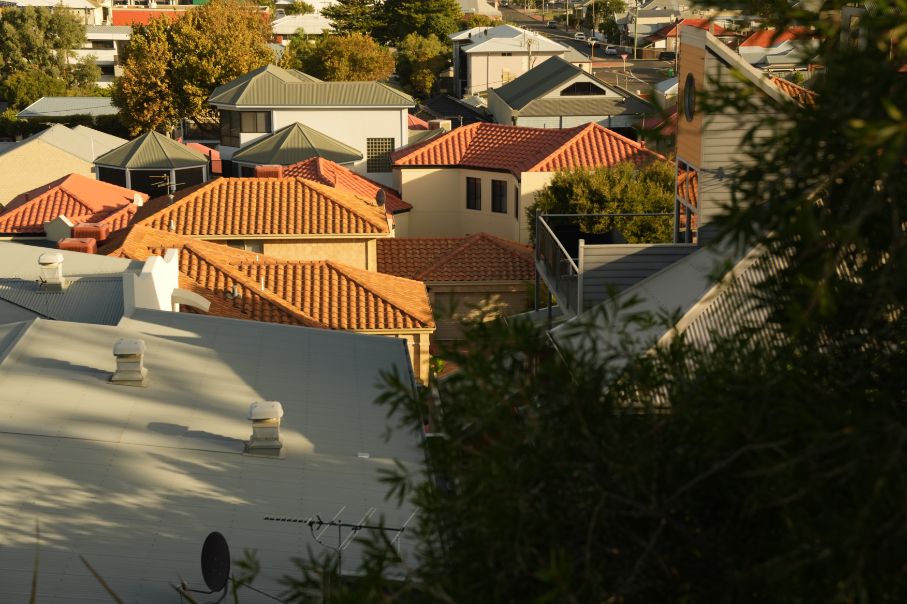 A downhill view of a cluster of houses in a WA suburb