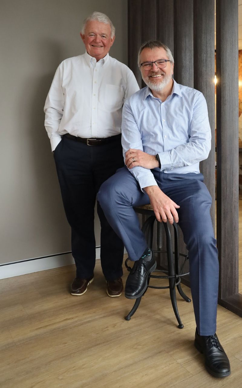 A portrait photo of John Atkin, Chair, and Mark Glasson, CEO.