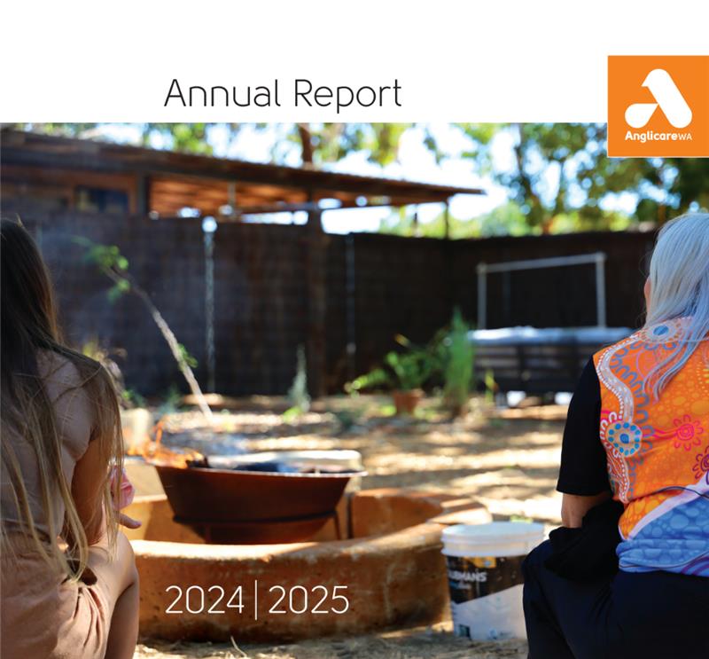 Cover image of the 2024 - 2025 annual report that has a service member with a community member sitting by a firepit.