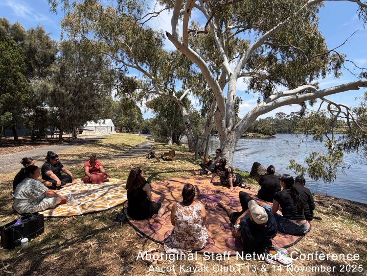 Aboriginal employees gather together for reflections by the river as part of Anglicare WA's Aboriginal Staff Network Conference.