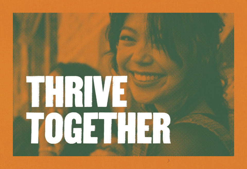 Photo of Orange screen print style banner with three people leaning against a street wall.