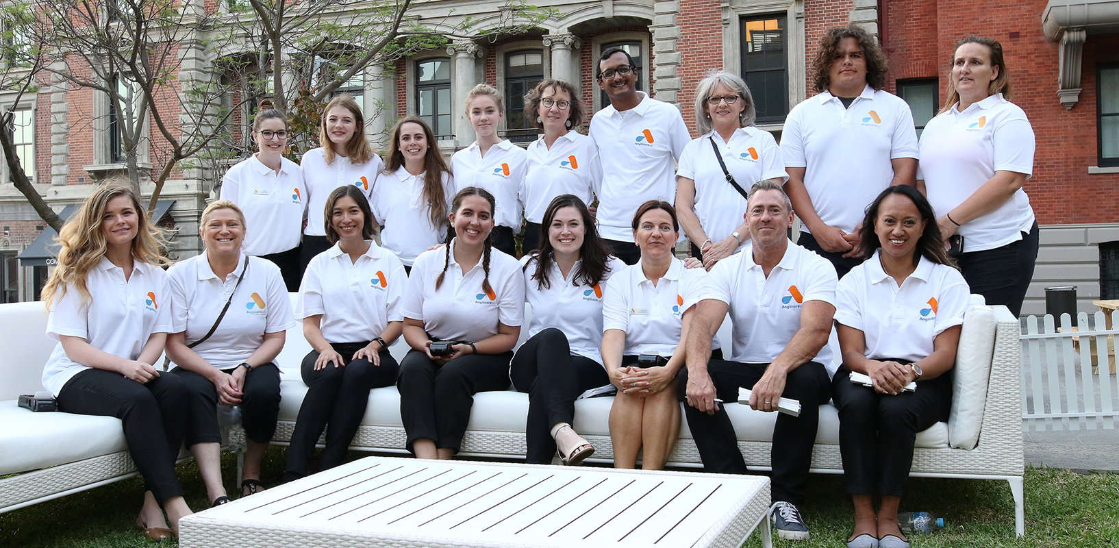 Group of Anglicare WA volunteers sitting down outside